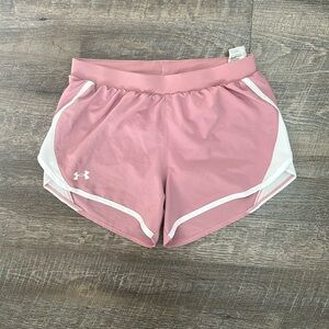 Women’s Under Armour loose heat gear light pink running shorts size small